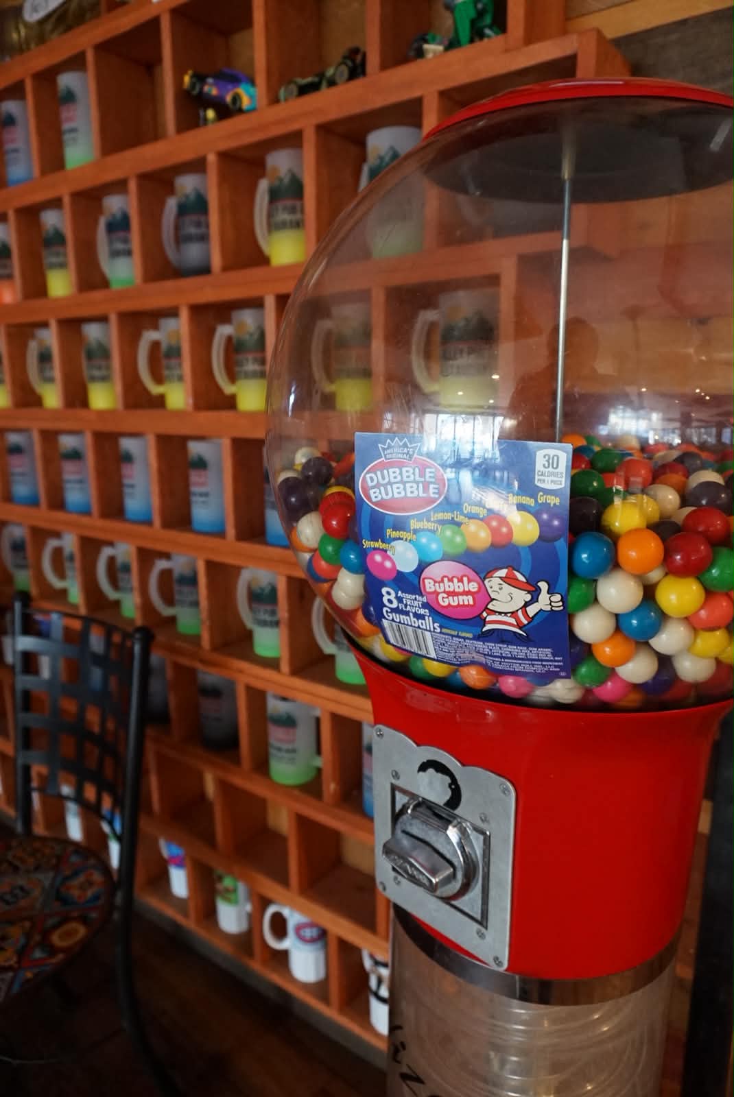 Gumball machine and Valley Pub mugs near the dining room